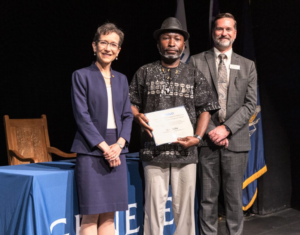 Kodjo Adabra accepts award