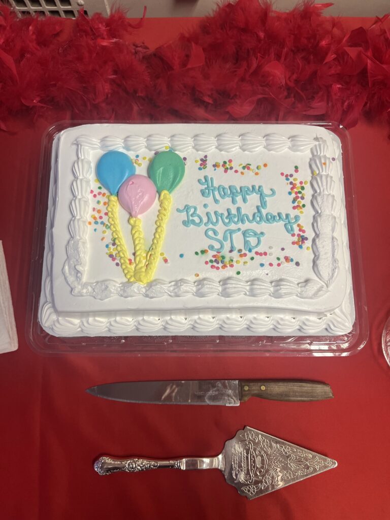 Birthday cake with "Happy Birthday STD" written on it