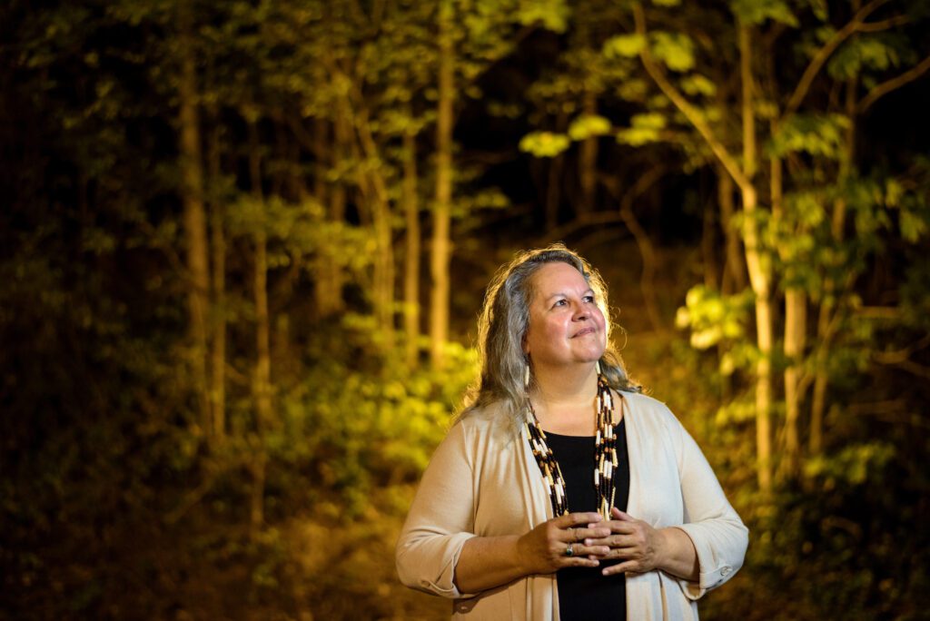 Portrait of Robin Wall Kimmerer in the woods