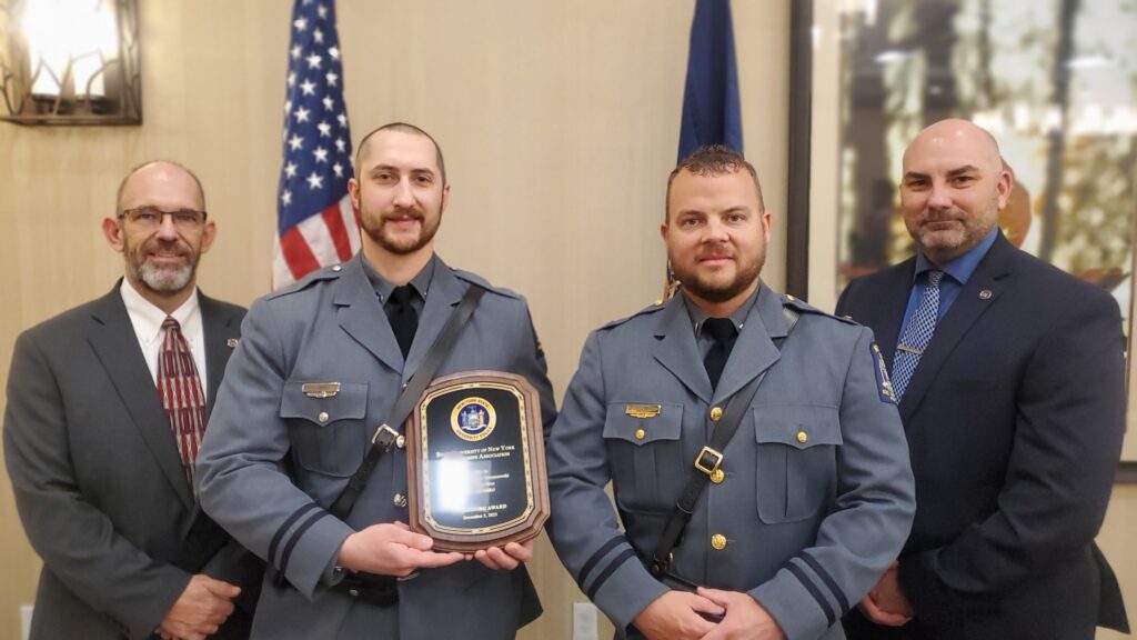 upd officers holding award