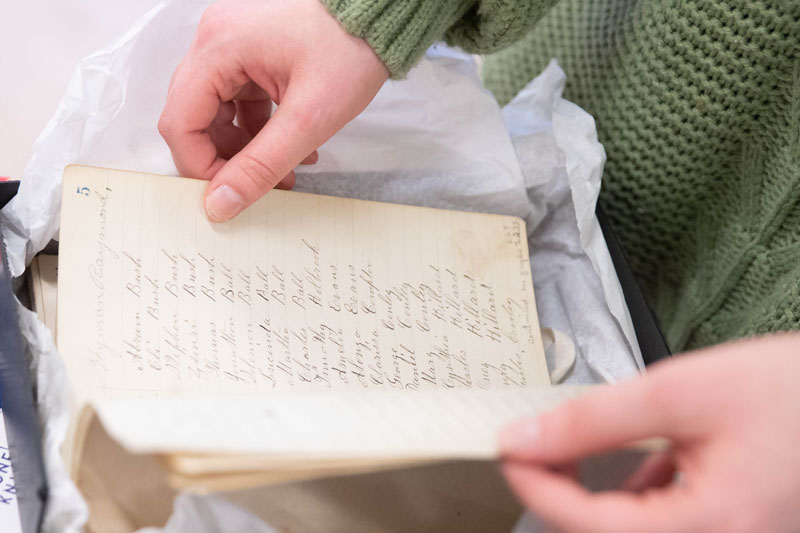 Person looking at a handwritten note