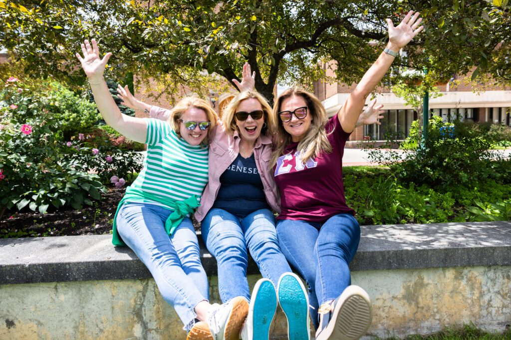 Tammy Baker Frisbey ’94, at left, Tanya Woldbeck Pellettiere ’93, and Dana Iserino Reino ’94. (SUNY Geneseo/Matt Burkhartt)