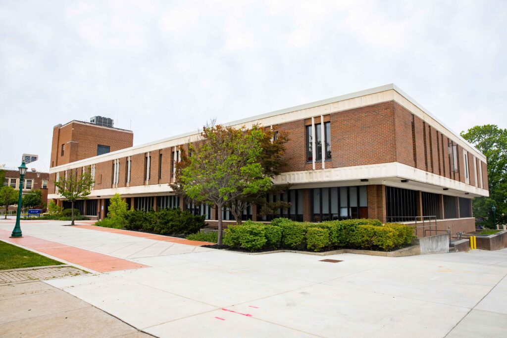 Image of large brick building on SUNY Geneseo's campus known as Erwin Hall.